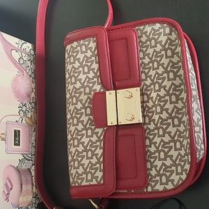 DKNY shoulder bag in red with brand name logo design.